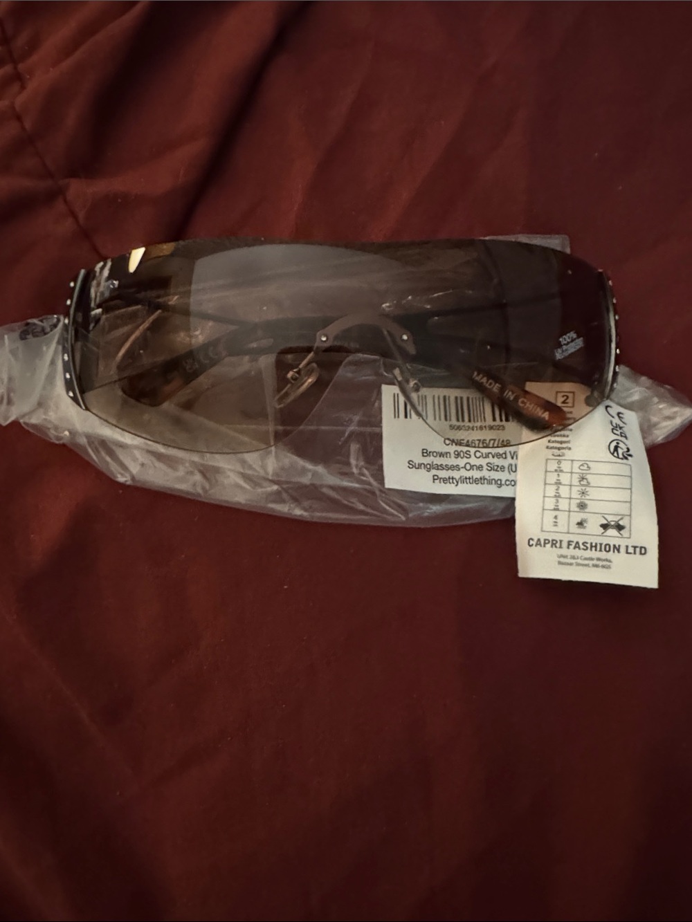 PrettyLittleThing Brown 90s Curved Visor Sunglasses